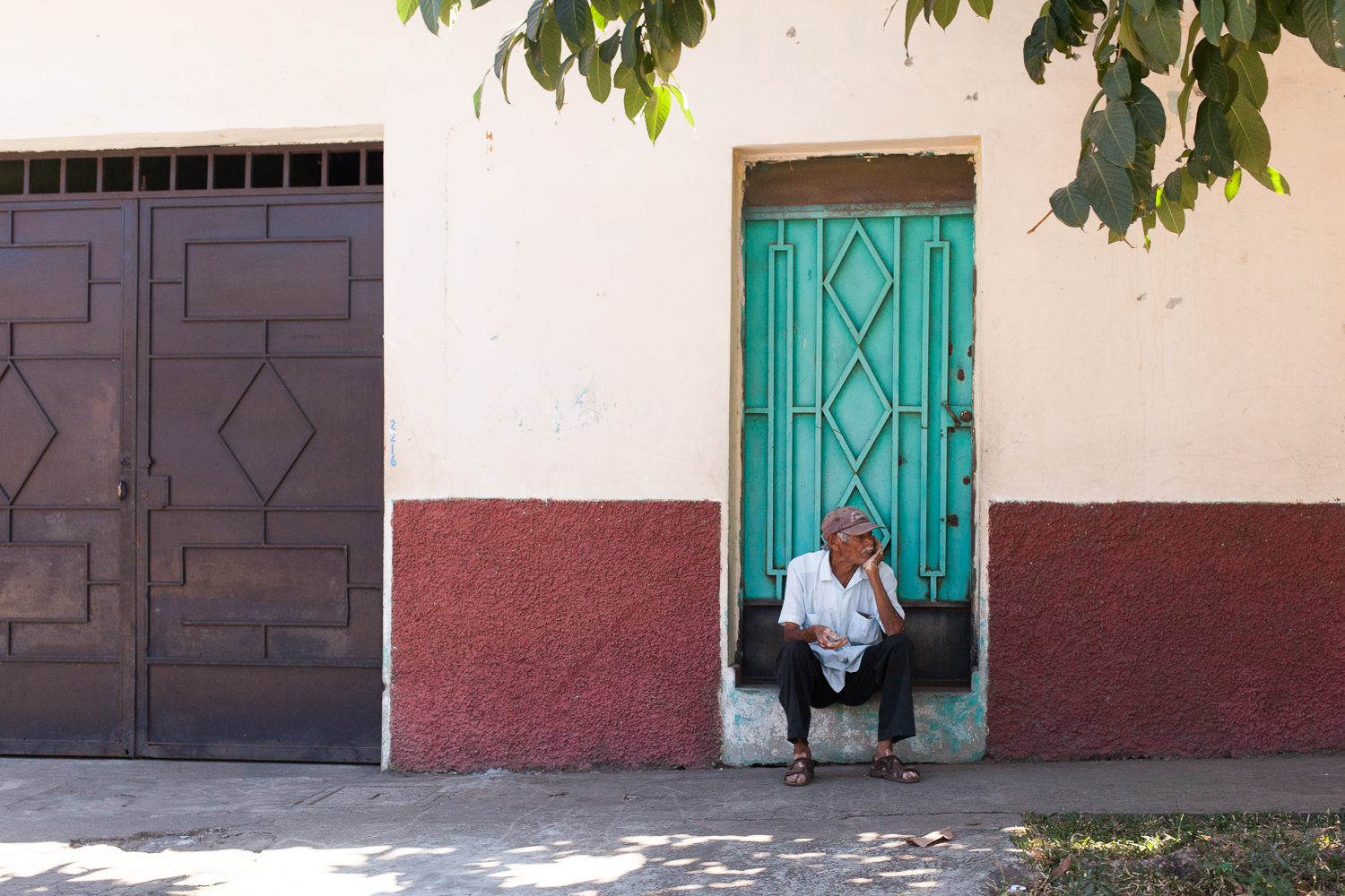 A man sitting on a stoop
