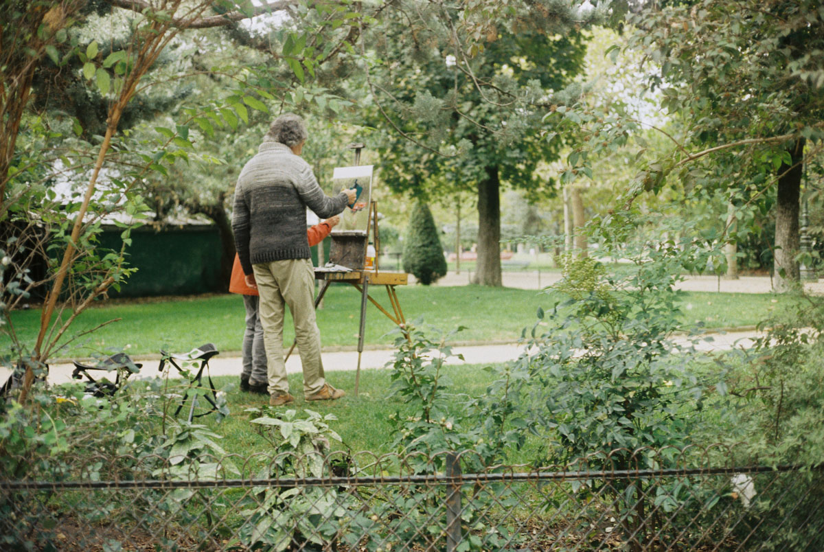 a painting instruction in a parisian park