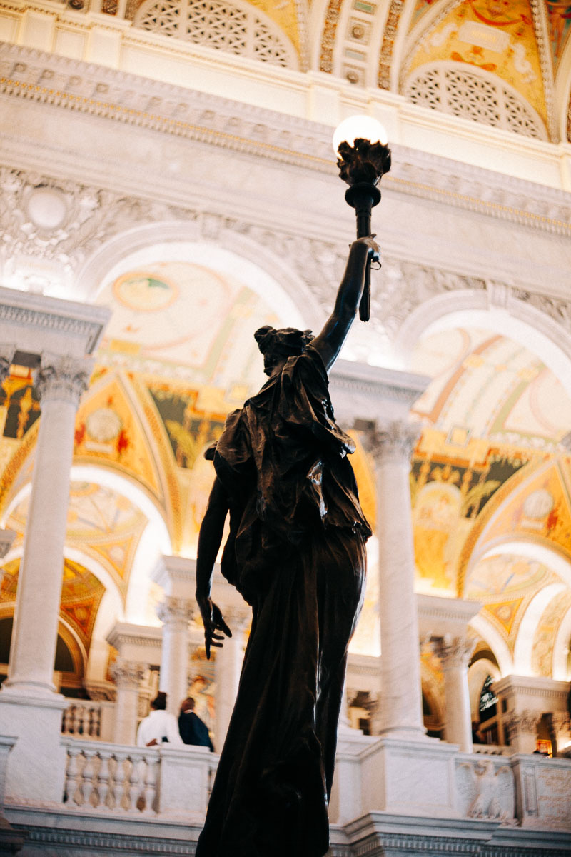 the Torchbearer statue inside the Library of Congress
