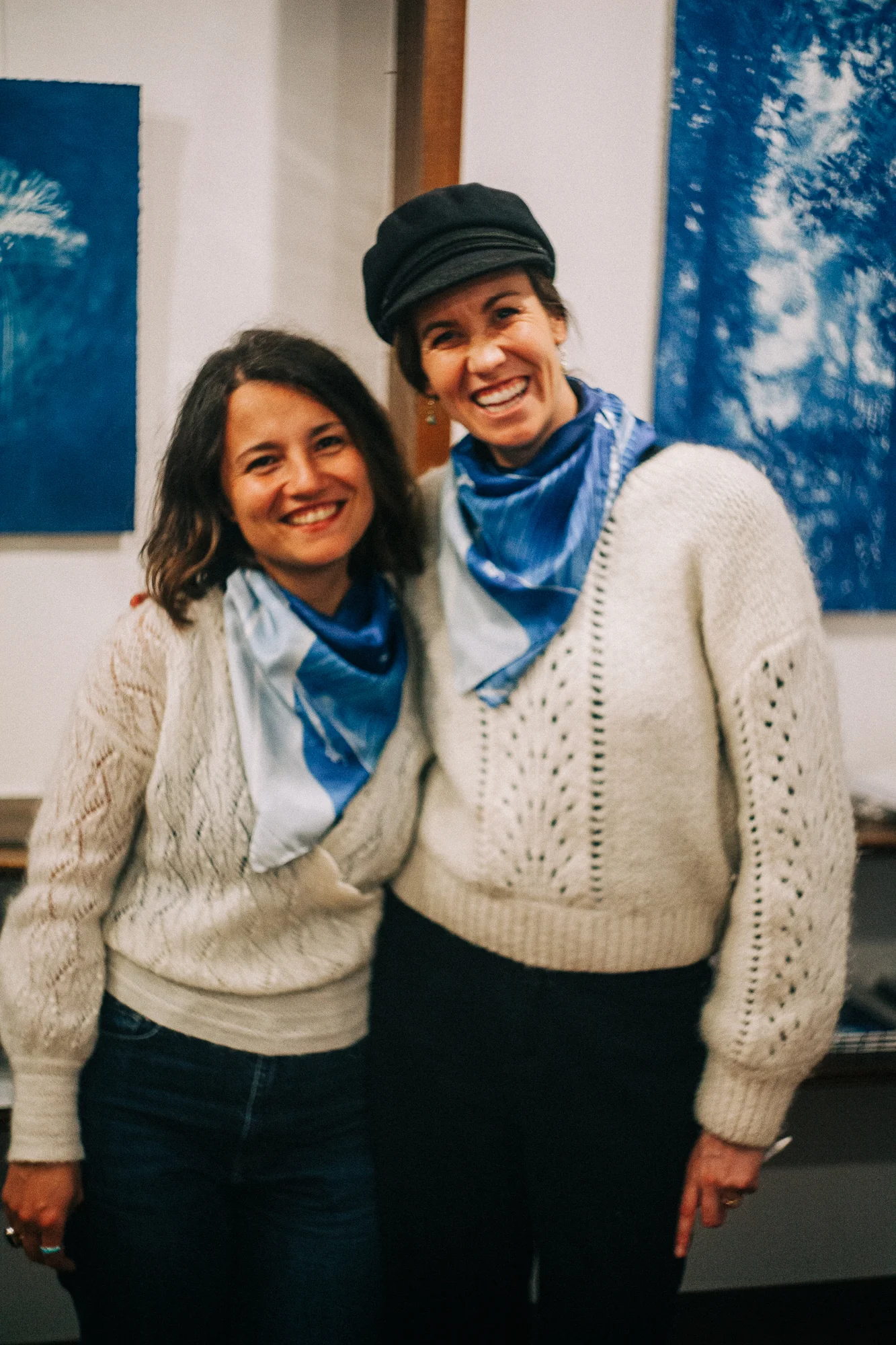 two women at an art openning