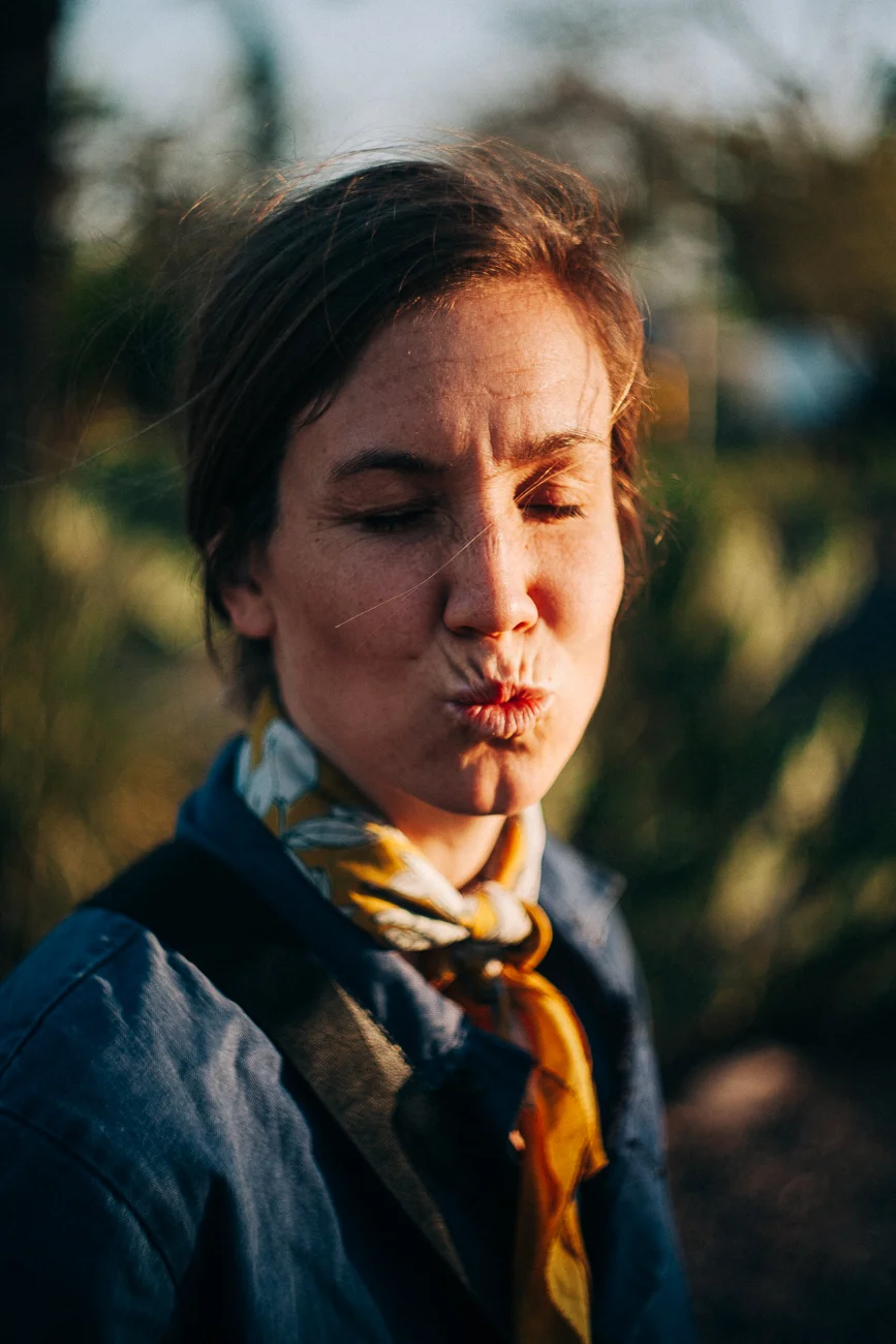 young woman at sunset