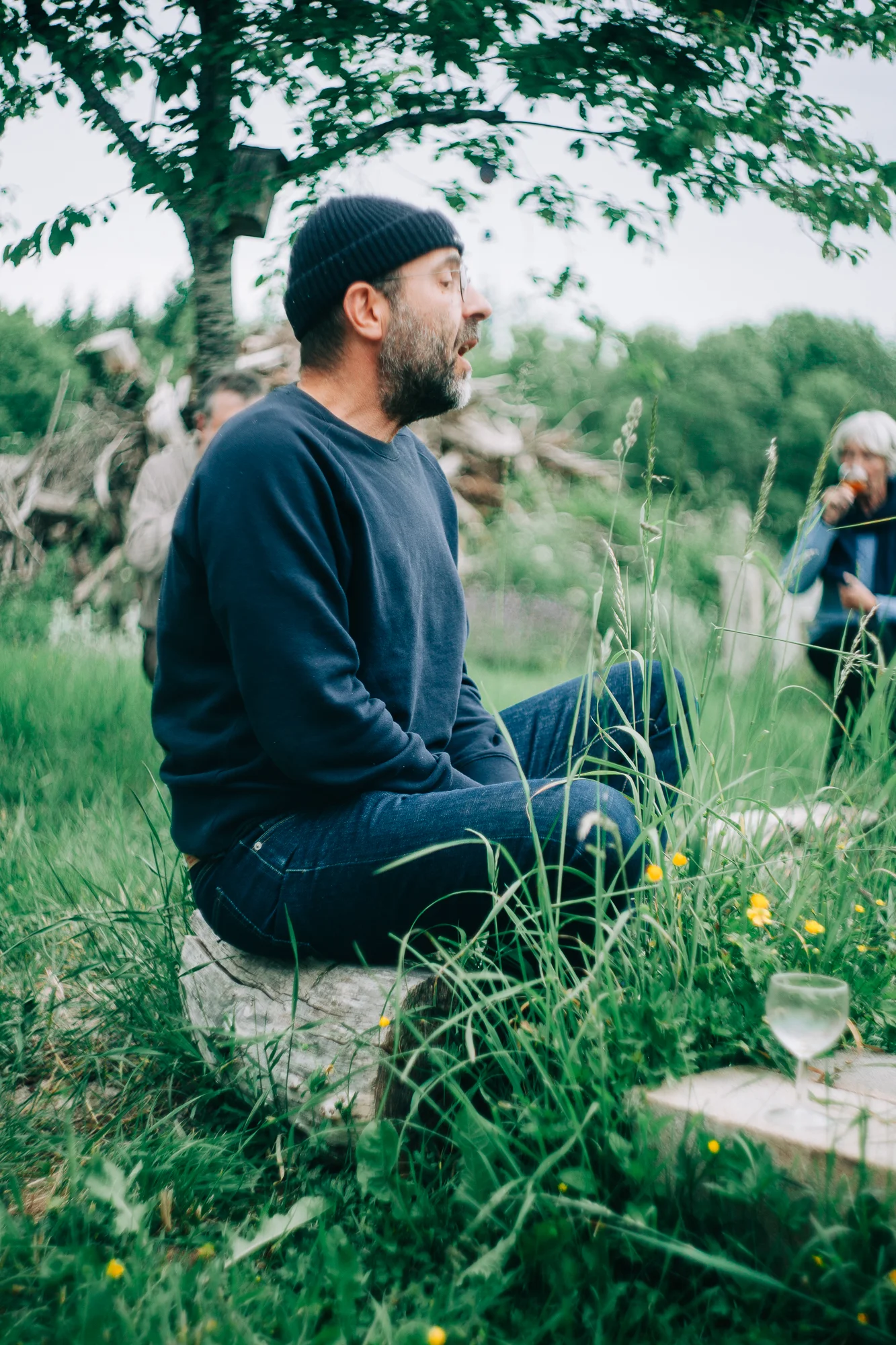 a man singing in the grass