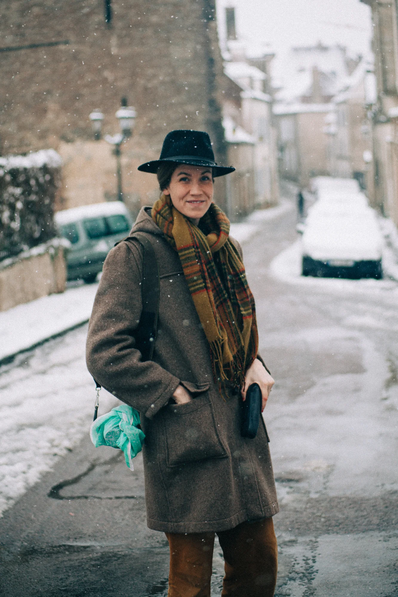 a women walking in the snow