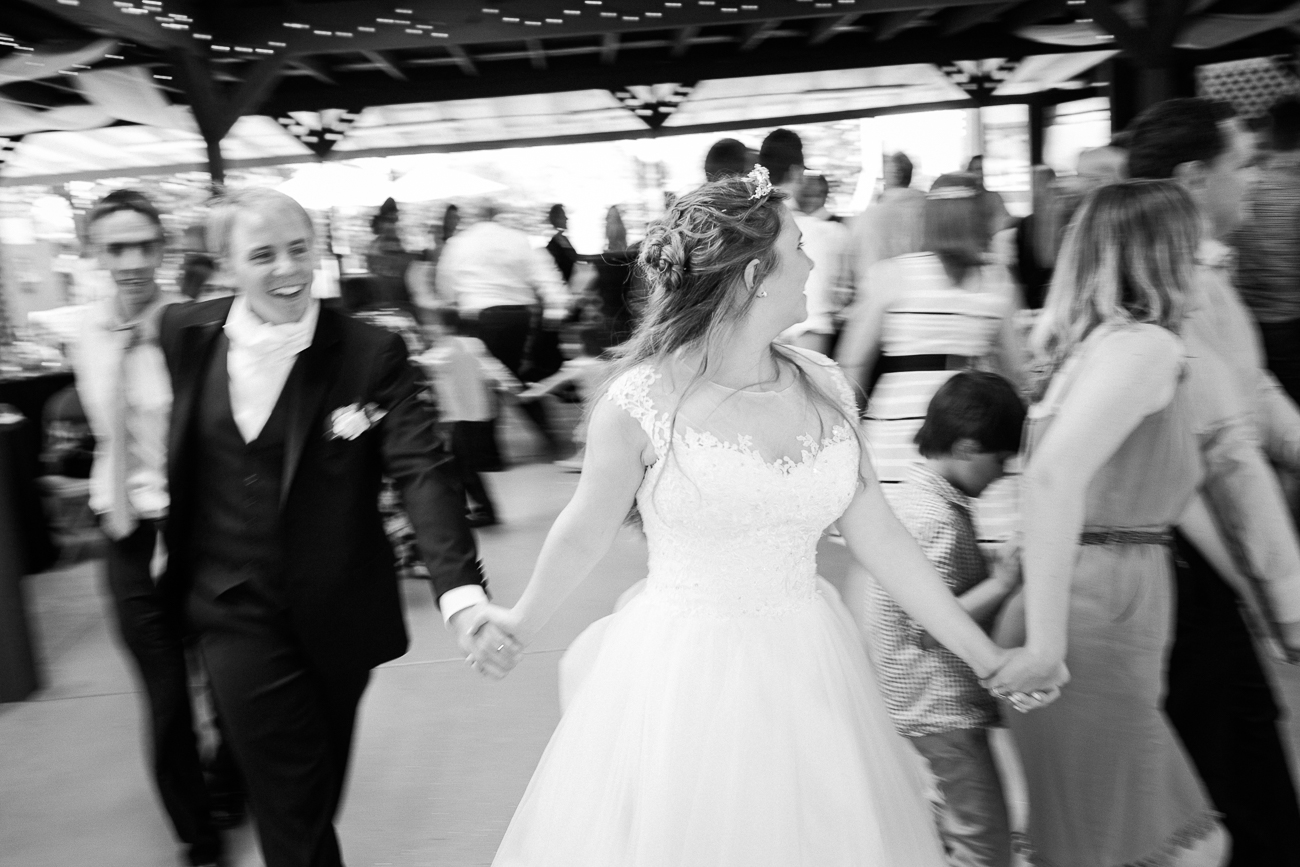 a wedding party dancing with motion blur